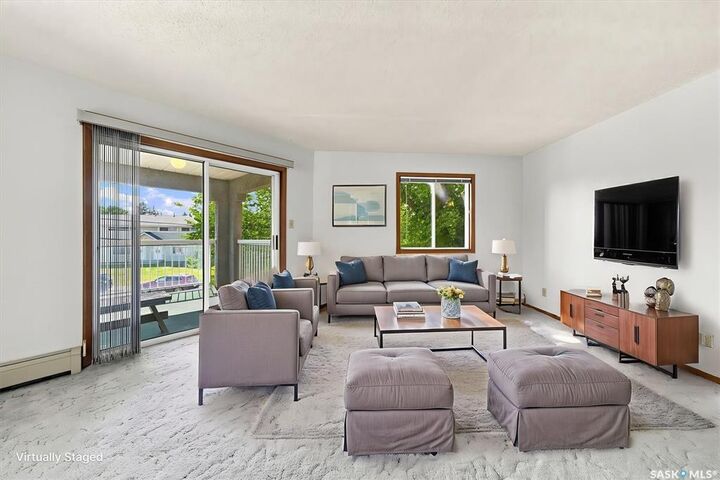 Property Photo:  1215 Louise Avenue 202  SK S7H 2P8 