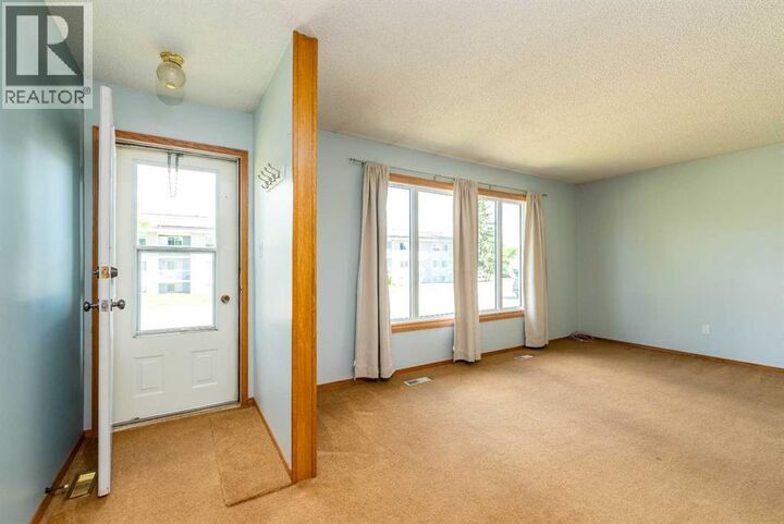 Property Photo: 3408 52 Avenue AB T9V 1H6
