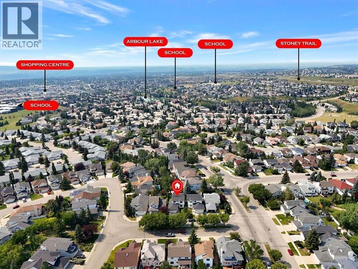Property Photo: 11 Arbour Summit Close Northwest AB T3G 3W1