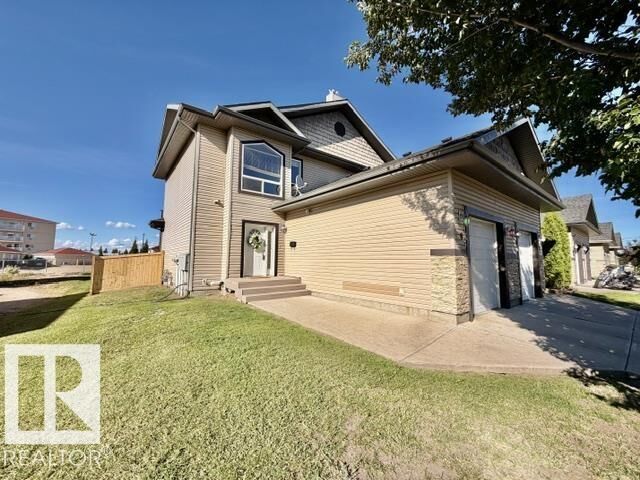 Property Photo:  4702 57 Avenue 8  AB T9A 3S9 