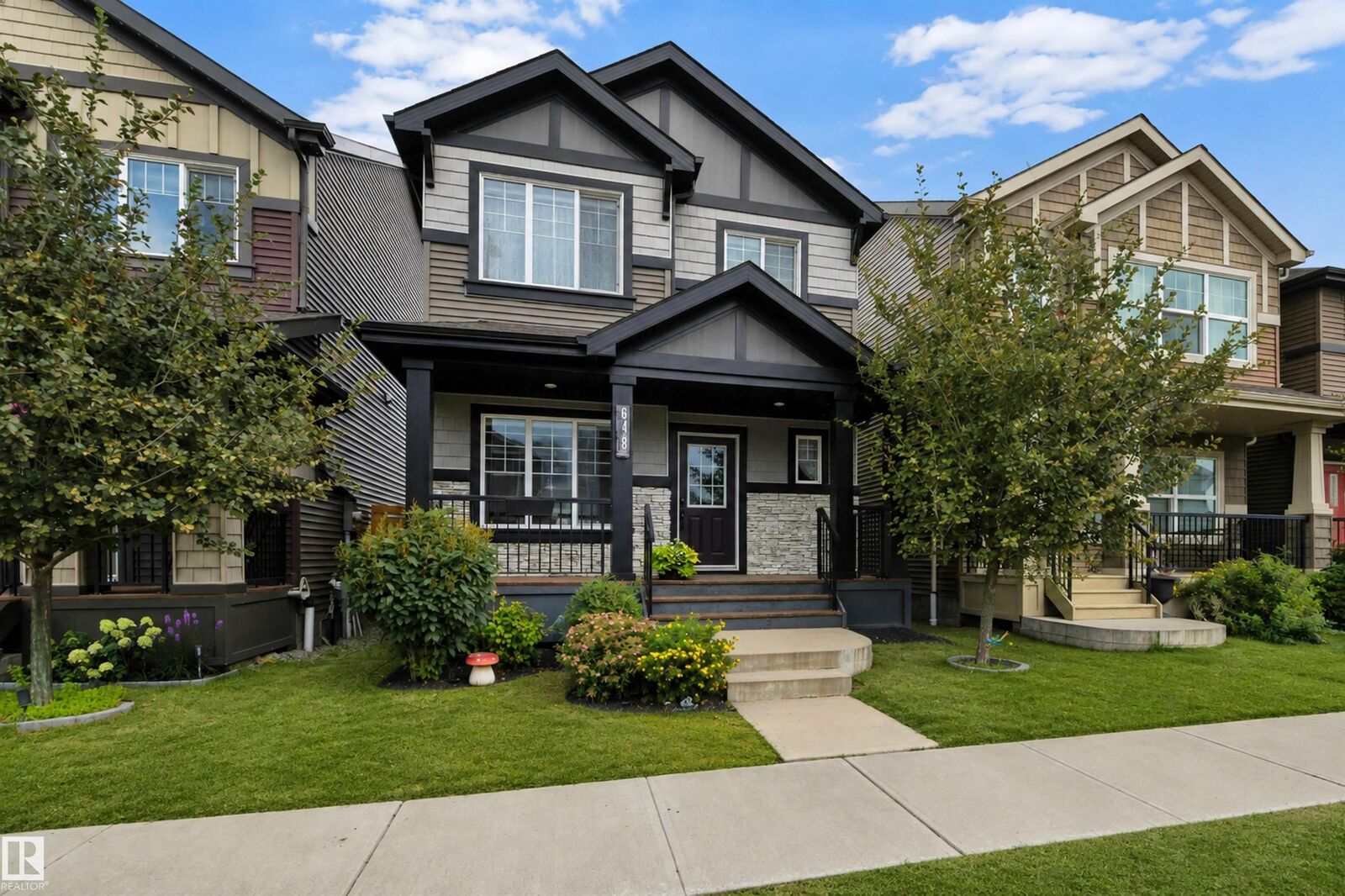 Property Photo: 648 Orchards Boulevard SW AB T6X 2L4