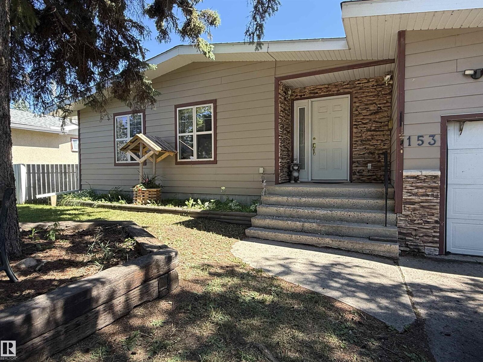 Property Photo: 153 Maple Crescent AB T9A 2E3