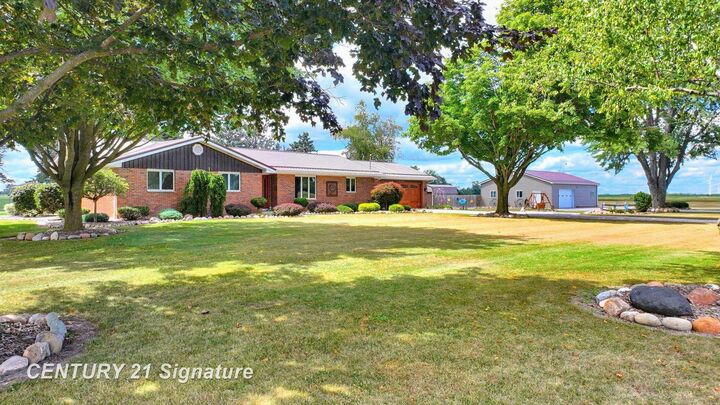 Property Photo:  10463 N Woodbridge Road  MI 48662 