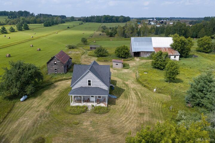 Property Photo:  1202 S 13.5 Lane  MI 49807 