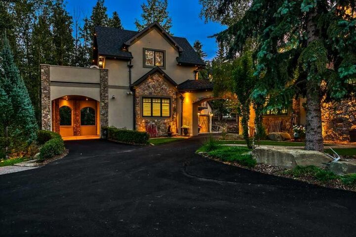 Property Photo: 55 Bearspaw View AB T3R 1A4