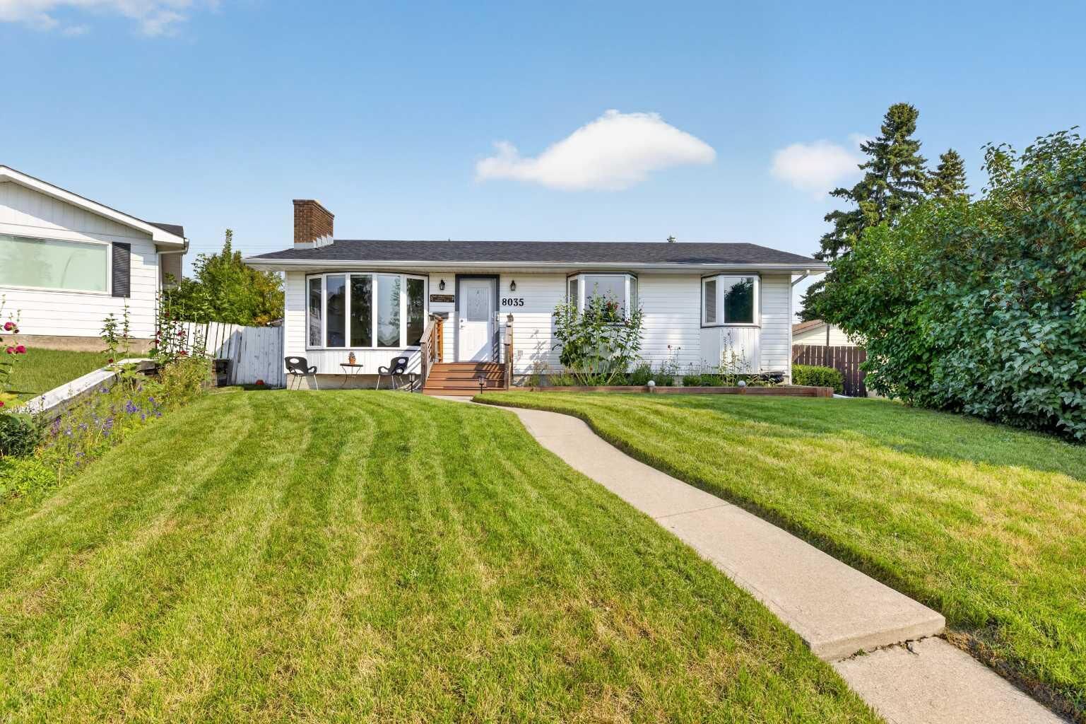 Property Photo: 8035 Huntwick Crescent NE AB T2K 4H7