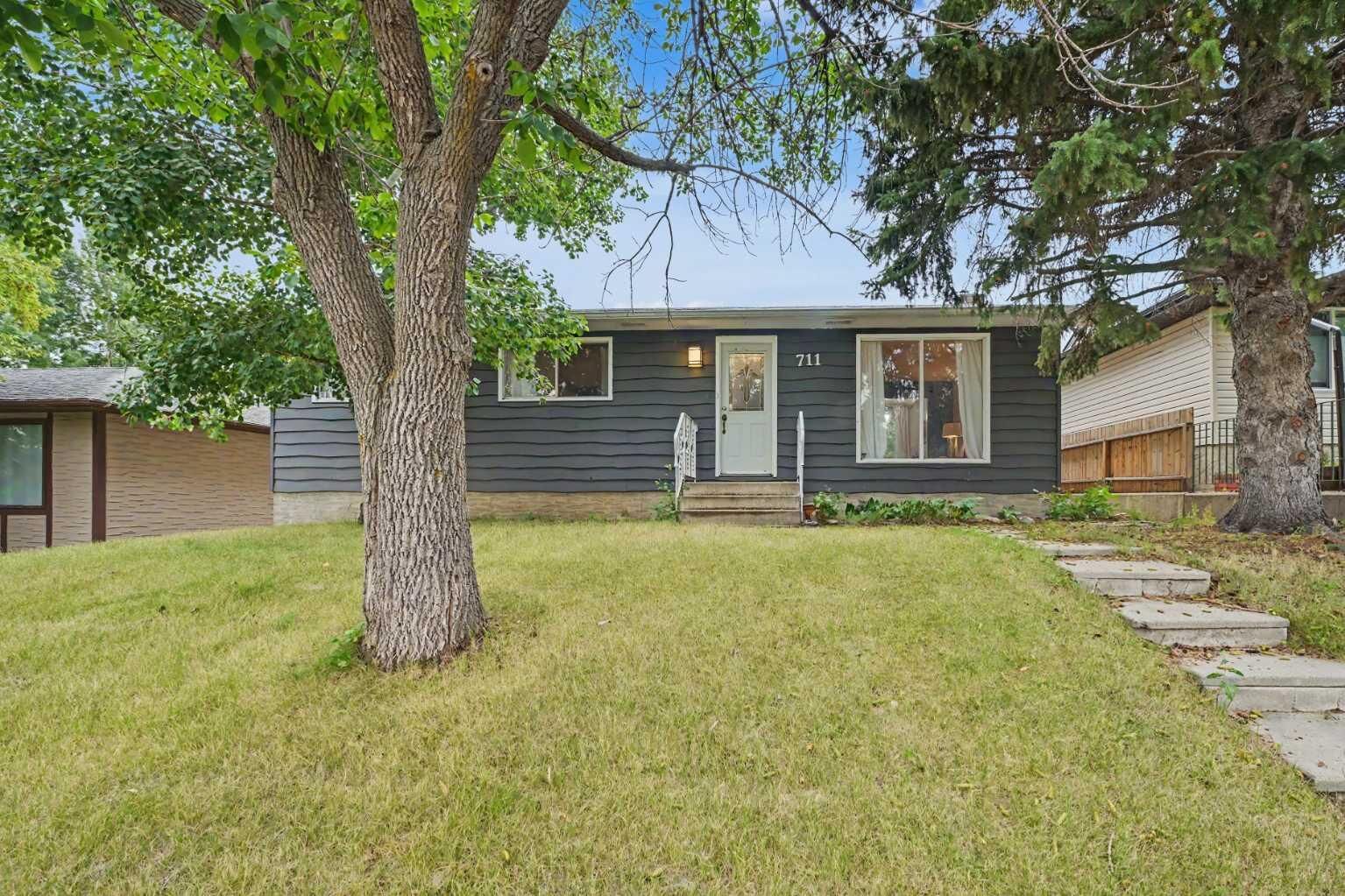 Property Photo: 711 118 Avenue SW AB T2W 0E6
