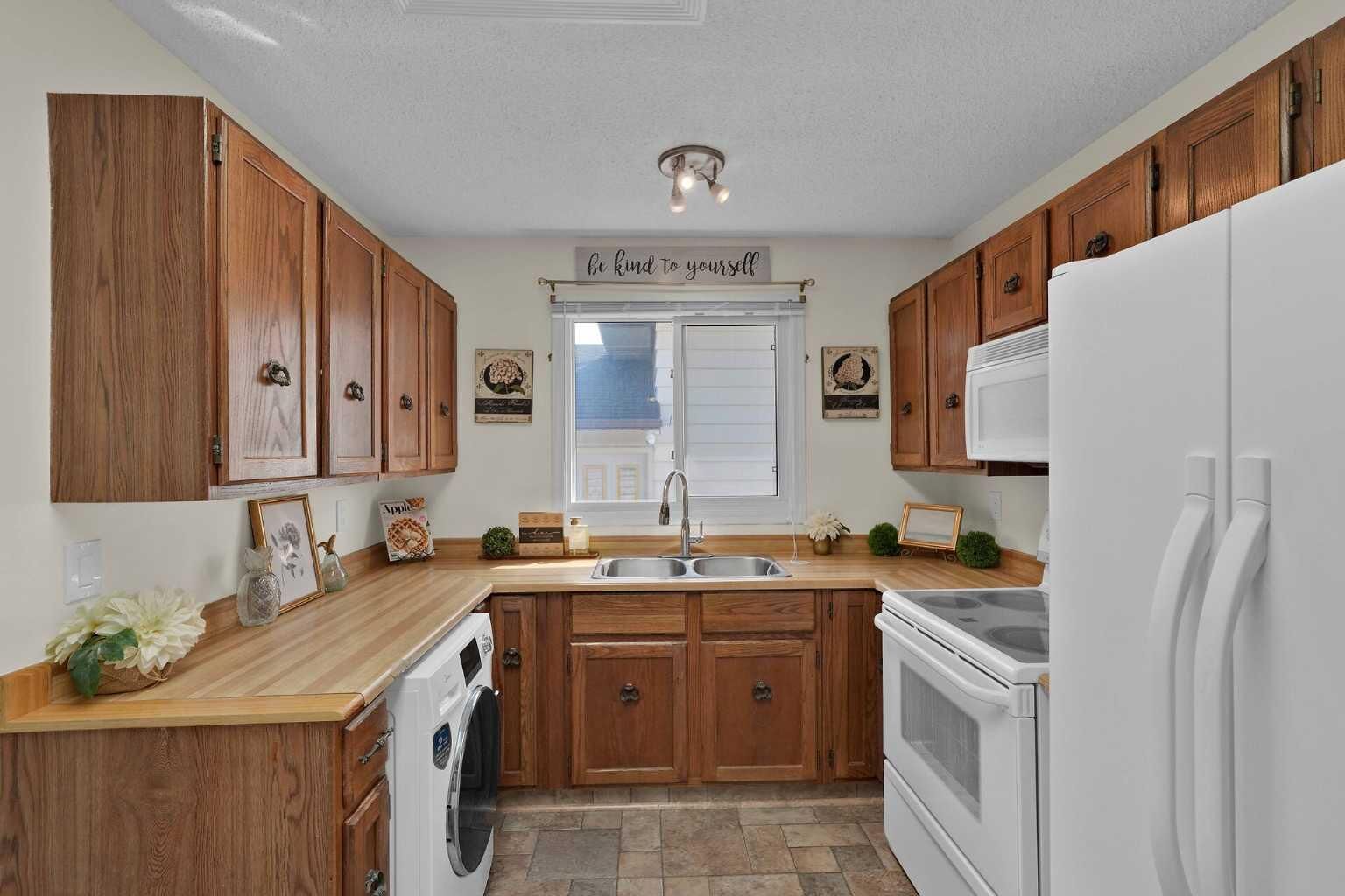 Property Photo: 27 Bedridge Way NE AB T3K 1M2