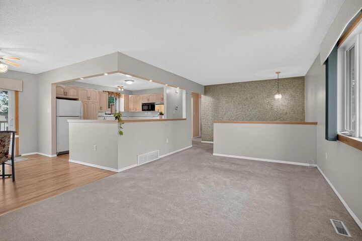 Property Photo: 152 Maddock Way NE AB T2A 3X3