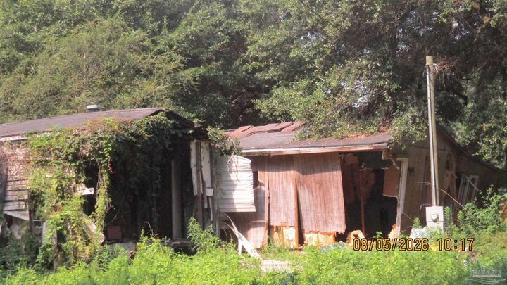 Property Photo:  9741 Fowler Ave  FL 32534 