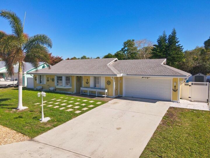 Property Photo:  888 NE Maranta Terrado  FL 34957 