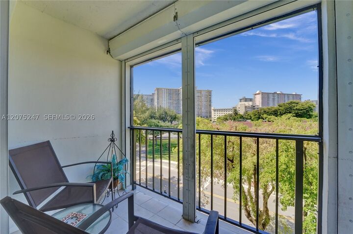 Property Photo:  201 178th Dr 403  FL 33160 
