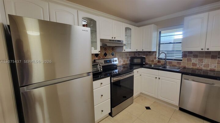 Property Photo: 2410 Deer Creek Country Club Blvd 310E FL 33442