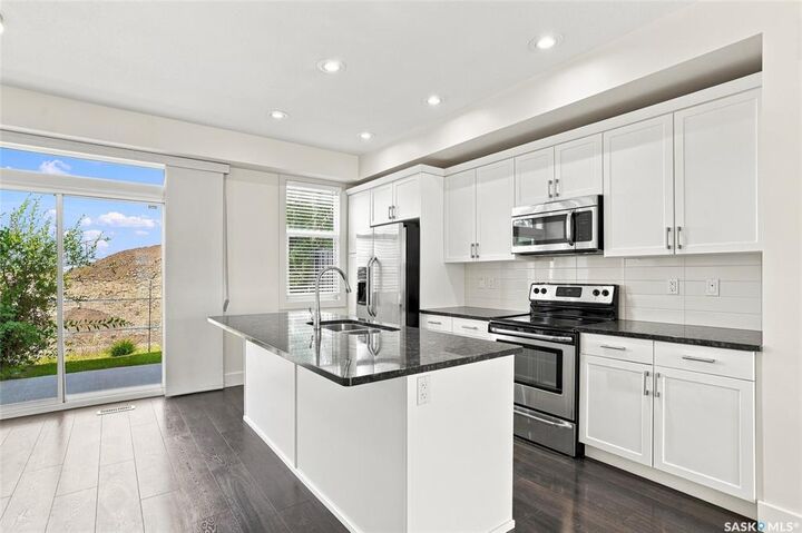 Property Photo: 701 Meadows Boulevard 724 SK S7V 0L3