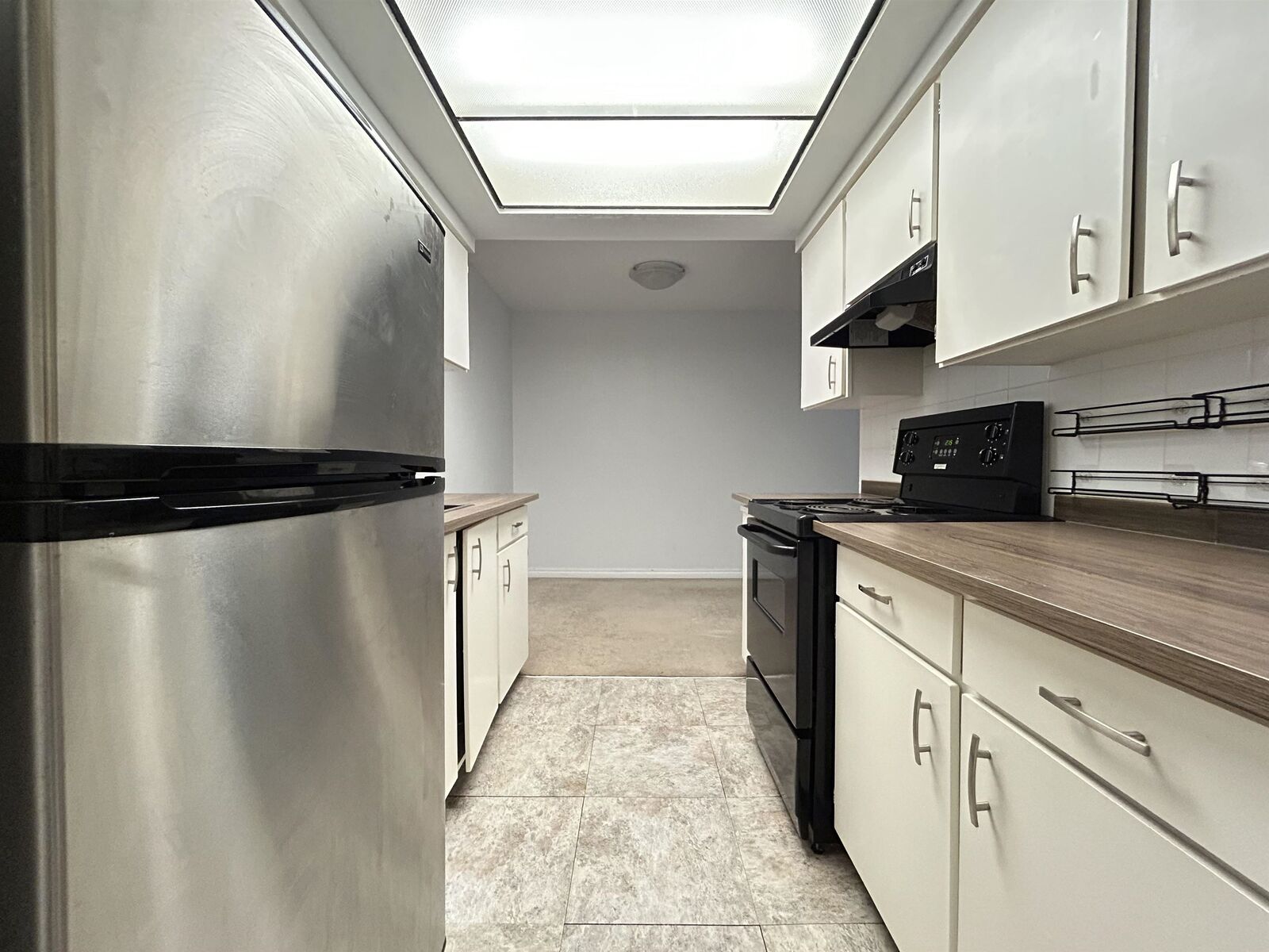 Property Photo:  6560 Buswell Street 201  BC V6Y 2G7 