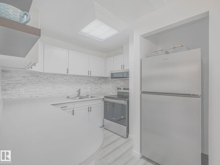 Property Photo: 10148 118 Street NW AB T5K 1Y4