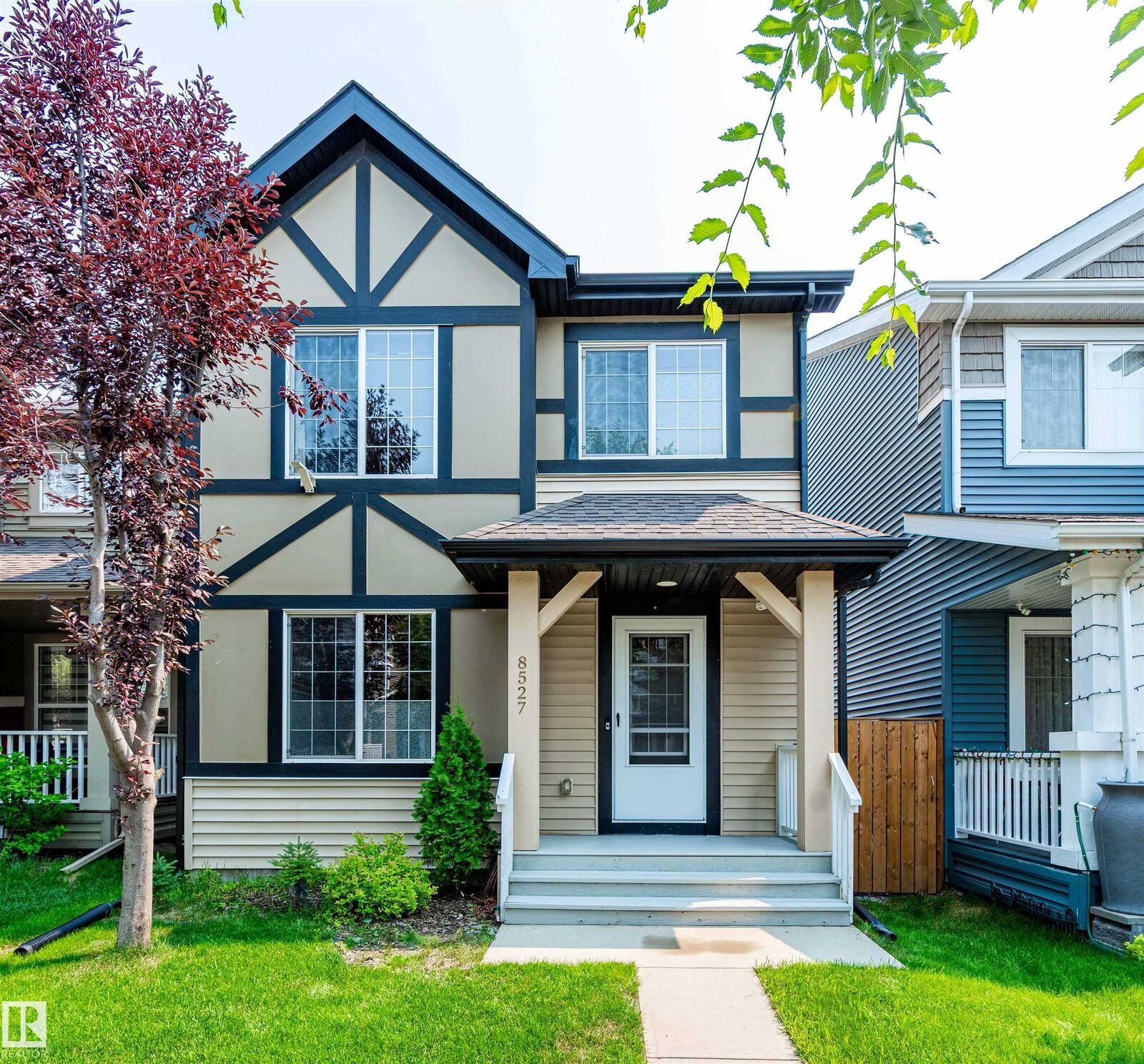 Property Photo:  8527 Ellis Link NW  AB T6M 0P5 