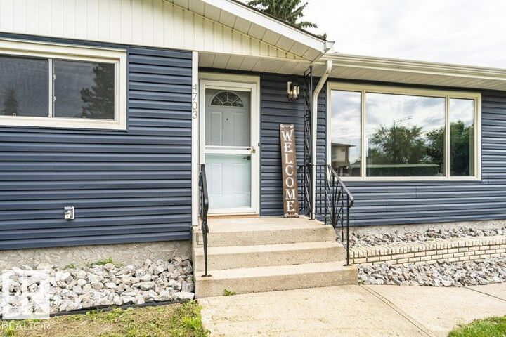Property Photo: 4703 117 Street NW AB T6H 3R7