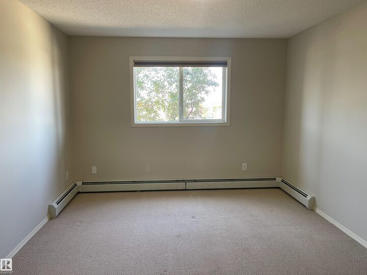 Property Photo:  2430 Guardian Road NW 319  AB T5T 6X9 