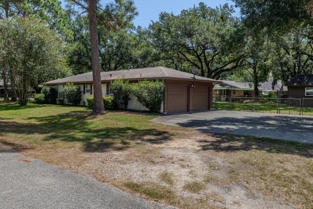 Property Photo:  1700 Mustang Avenue  TX 77414 