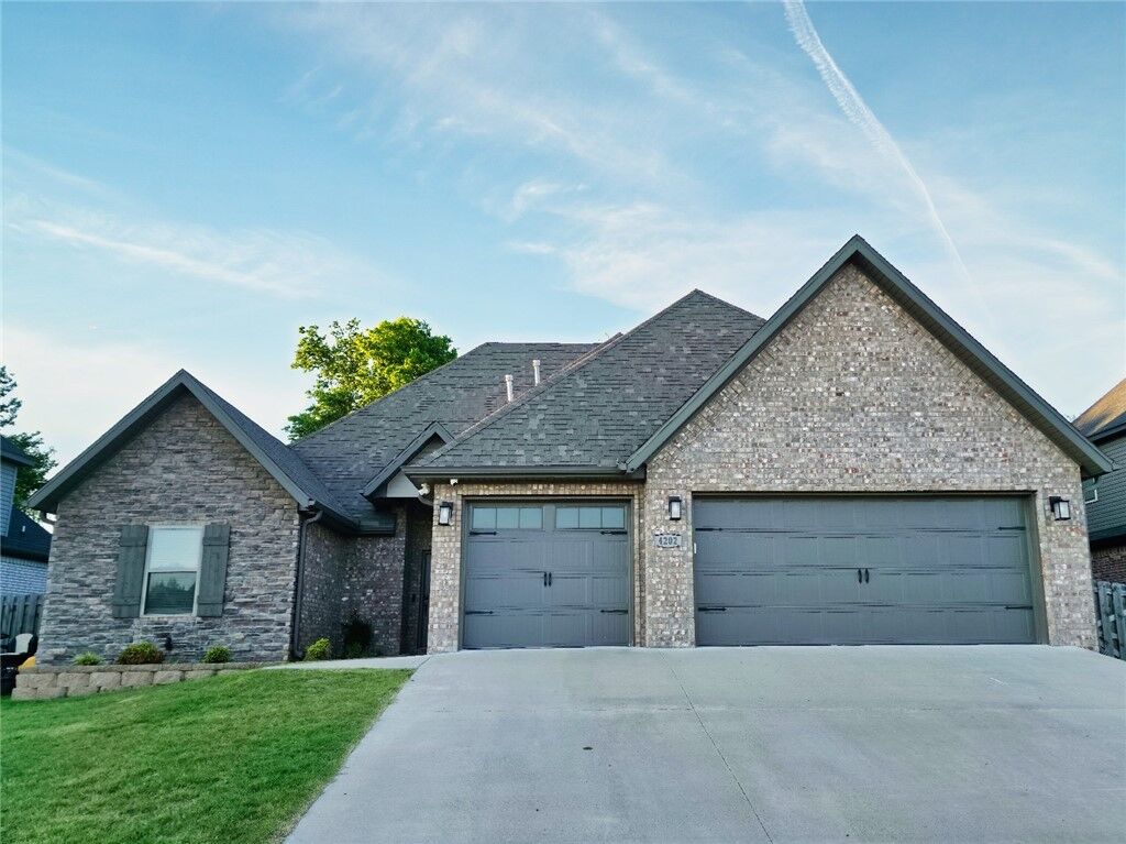 Property Photo:  4202 SW Plumley Avenue  AR 72713 