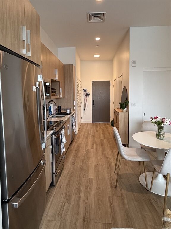 Property Photo:  301 Guest St 304  MA 02134 