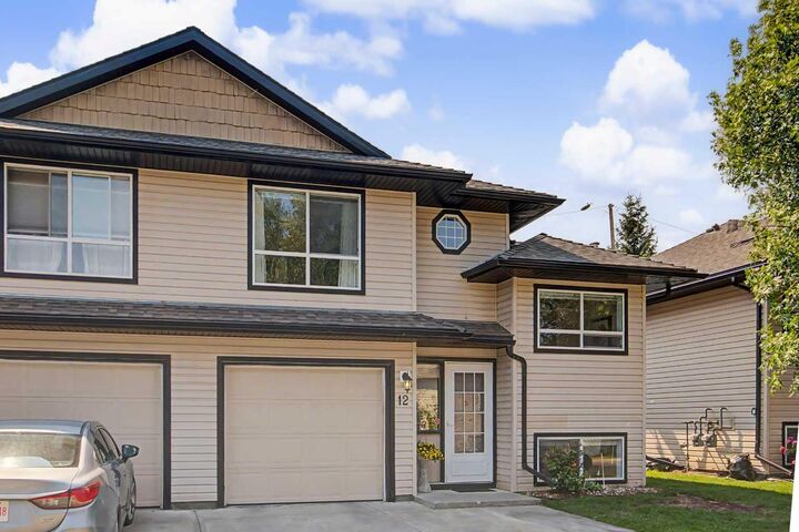 Property Photo:  103 Fairways Drive NW 12  AB T4B 2Y5 