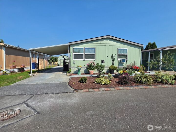 Property Photo: 1120 S 25th St 95 WA 98274