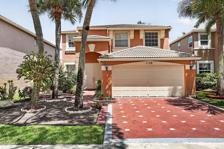 Property Photo: 1158 Oakwater Drive FL 33411