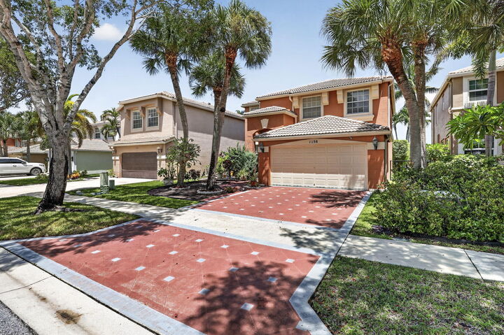 Property Photo:  1158 Oakwater Drive  FL 33411 