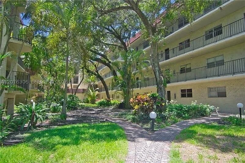 Property Photo: 3280 Spanish Moss Ter 103 FL 33319