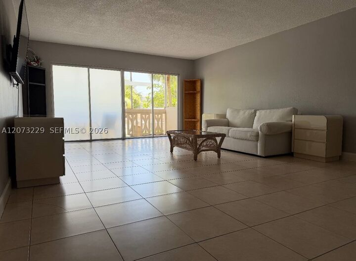Property Photo:  800 NE 195th St 211  FL 33179 