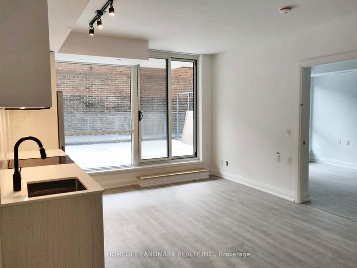 Property Photo:  2369 Danforth Avenue 202  ON M4C 0B1 