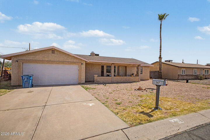 Property Photo:  547 E Quail Avenue  AZ 85119 
