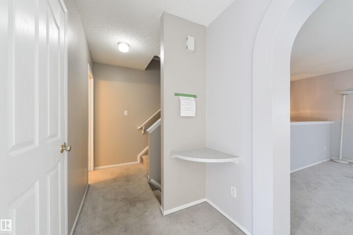 Property Photo:  1670 Jamha Road NW 123  AB T6L 7B3 