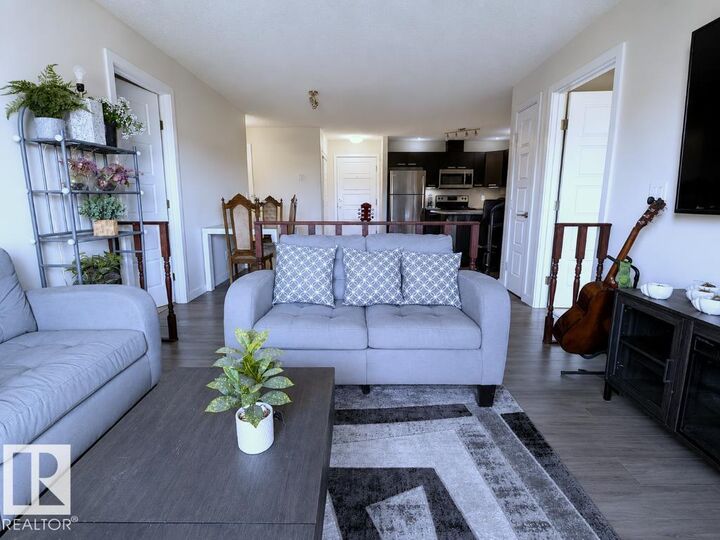 Property Photo:  14808 125 Street NW 311  AB T5X 0G1 
