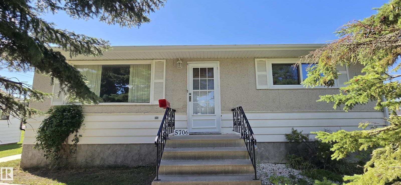 Property Photo: 5706 52 Street AB T9C 1J2