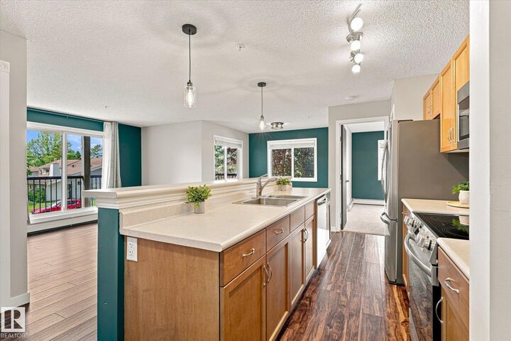 Property Photo:  1180 Hyndman Road NW 240  AB T5A 0P8 