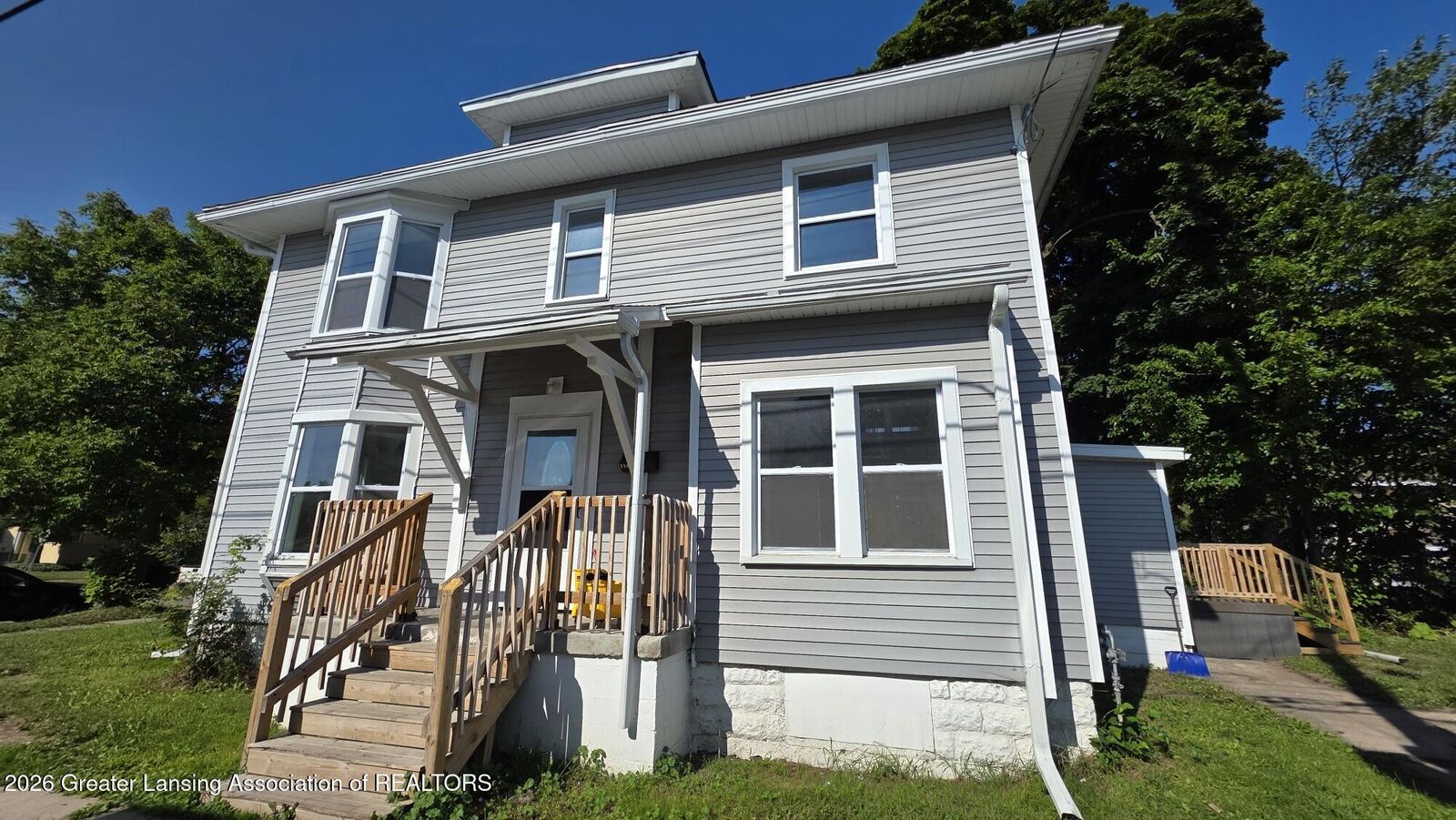 Property Photo:  118 W Barnes Avenue  MI 48910 