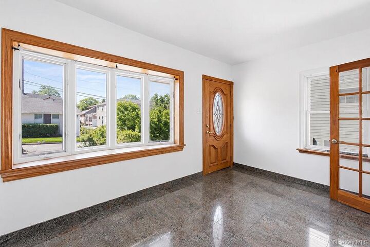 Property Photo:  99-11 159th Avenue  NY 11414 