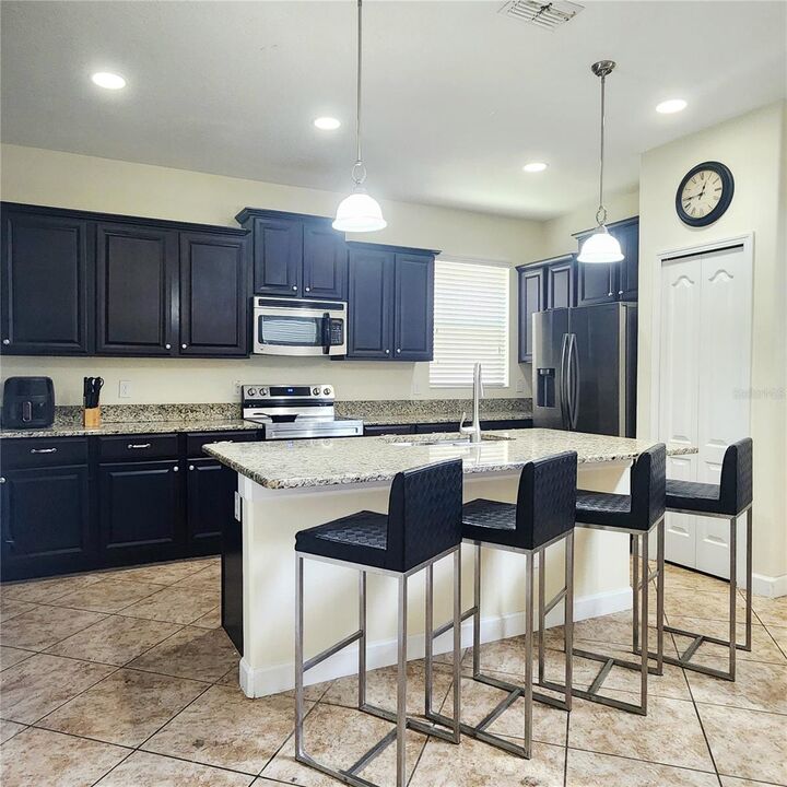 Property Photo:  8935 Cuban Palm Road  FL 34747 
