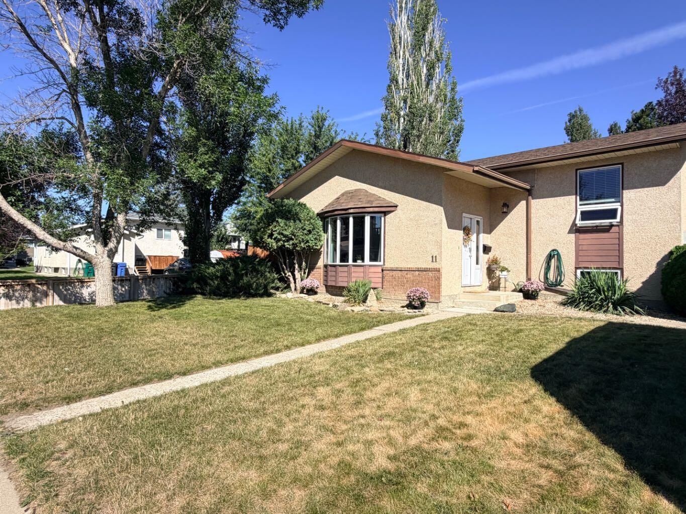 Property Photo: 11 Lakhota Crescent W AB T1K 6J3