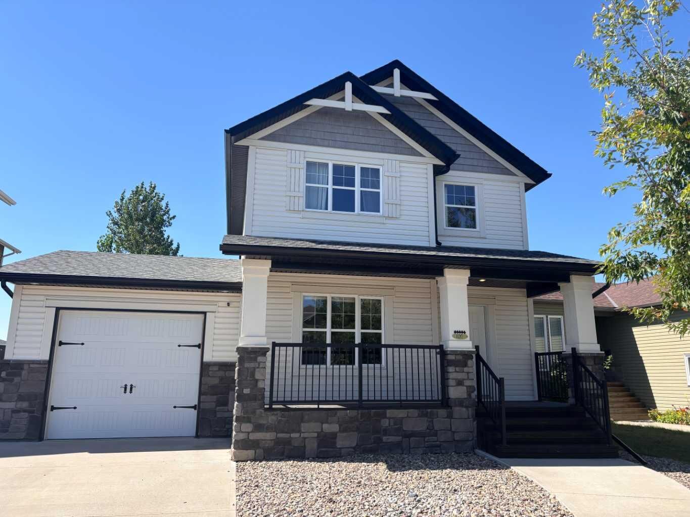 Property Photo:  120 Mt Sundial Court W  AB T1J 5B7 
