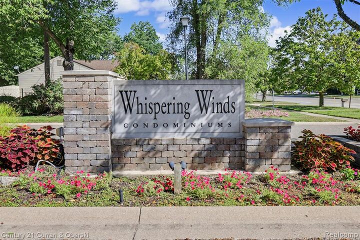 Property Photo:  9398 Westwind Drive 49  MI 48150 