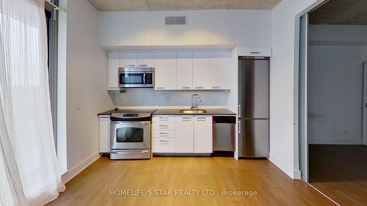 Property Photo: 630 Queen Street E 603 ON M4M 1G3