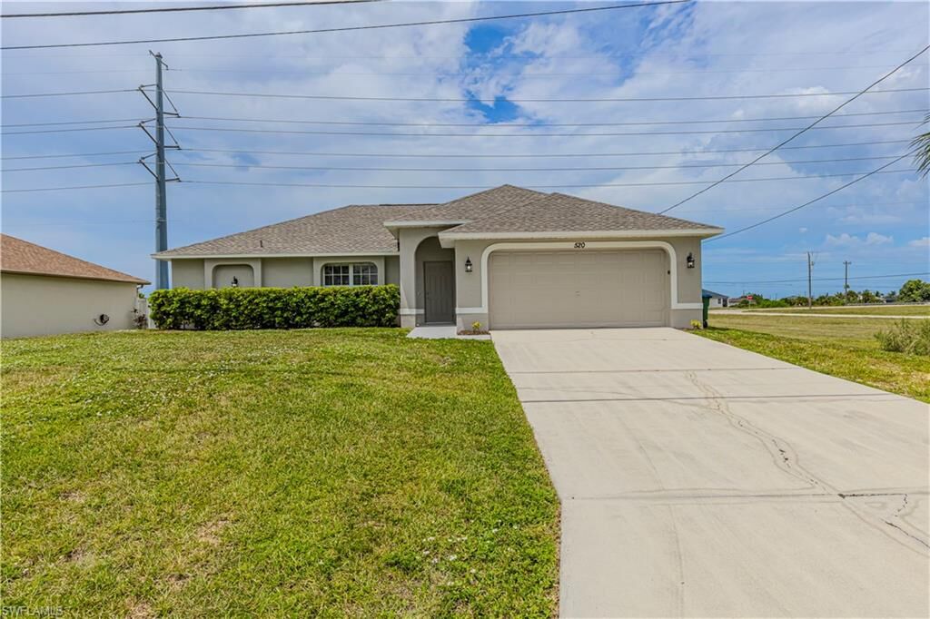 Property Photo: 520 NW 24th Ave FL 33993