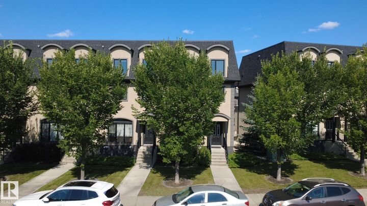 Property Photo:  5833 Mullen Place NW  AB T6R 0T5 