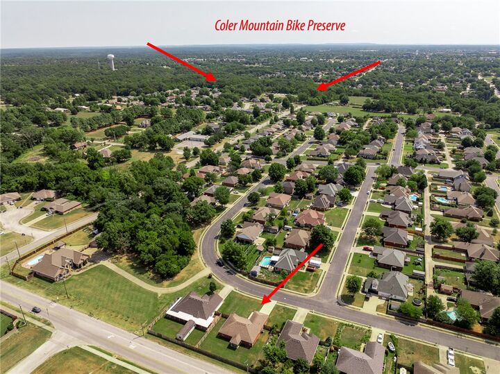 Property Photo:  120 NW Apple Blossom  AR 72712 