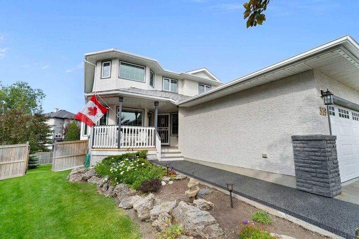 Property Photo: 319 Hawkland Place NW AB T3G 3R4