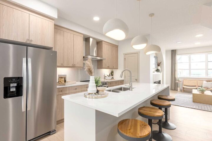 Property Photo: 404 Creekside Drive SW AB T2X 6P7